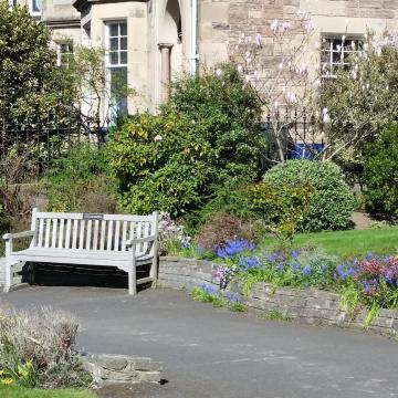 A bench on the path to the church