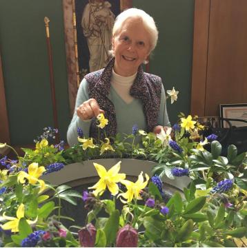 decorating the font with spring flowers